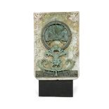 An English bronze wall sundial, early 20th century, mounted on marble, with scrolling foliate and
