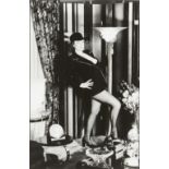 Helmut Newton, German/American 1920-2004, Regine at Home, 1975, 1984; silver print on wove, signed