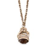 A 9ct gold neckchain with greenish smoky quartz fob, the fancy link neckchain suspending a fob