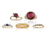 A group of five gold and gem-set rings comprising: a 22ct plain gold band ring, approx. size S, 4.