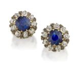 A pair of sapphire and diamond earrings, in the form of 19th century claw-set circular-cut