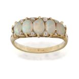 A late Victorian opal ring, the five oval opal cabochons to old cut diamond points in claw-set