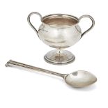 Omar Ramsden (1873-1939), Twin handled pedestal sugar bowl, and a spoon with reeded shaft and scroll