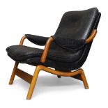 Designer Unknown, Lounge chair, circa 1970, Black leather, beech, ‘Danish Furniture Makers