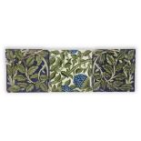 William de Morgan (1836-1917), Three tiles: two with green foliage on deep blue ground, circa