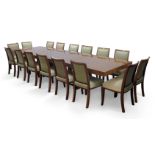 Manner of Jacques Adnet, Art Deco rosewood extending dining table with three additional leaves,