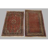 A Persian Senneh rug, 131cm x 80cm, together with an Iranian rug, 123cm x 82cmPlease refer to