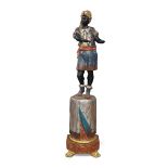 An Italian blackamoor figure on faux marble stand, 20th century, polychrome painted, raised on