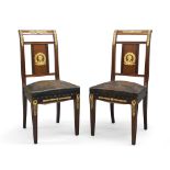 A pair of French Empire mahogany chairs, 19th century, gilt metal mounted, green leather upholstered