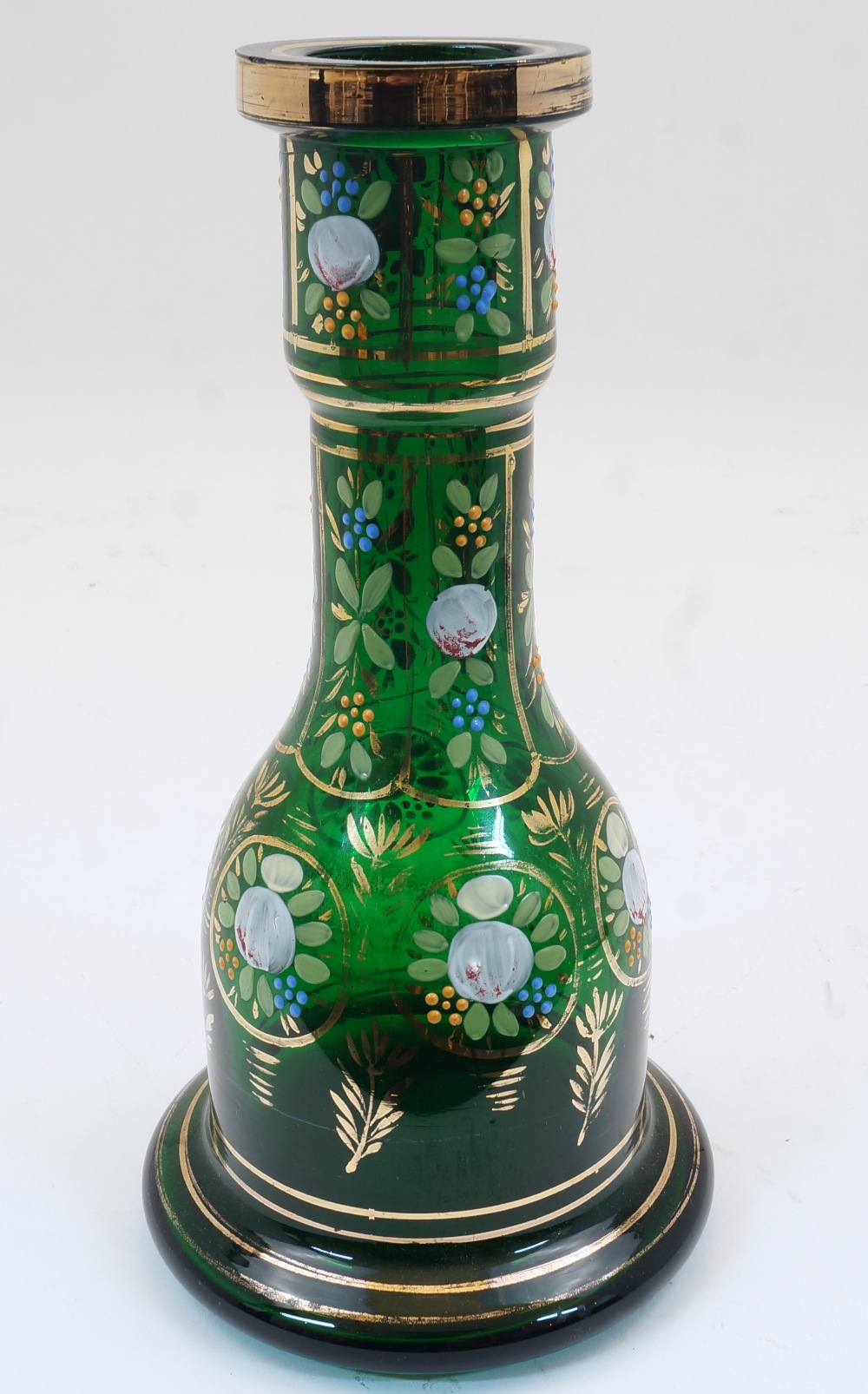 A Bohemian green glass bottle vase, 19th century, the thickly blown rim with gilt highlights, the