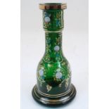 A Bohemian green glass bottle vase, 19th century, the thickly blown rim with gilt highlights, the