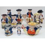 A group of Staffordshire Toby jugs, 19th century and later, to include a gentleman in blue jacket