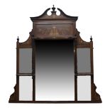 A late Victorian rosewood over mantle mirror, with broken swan neck pediment, marquetry inlay and