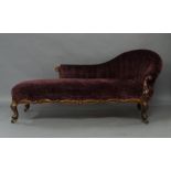A Victorian rosewood chaise lounge, with recent purple corduroy upholstery, the spoon back rest
