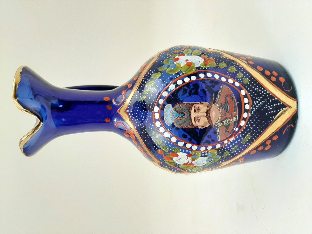 A Bohemian blue glass jug, 19th century, the body enamelled and gilded with foliate motifs and - Image 2 of 5