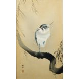 A Japanese watercolour painting of a stork, 20th century, depicted perching on a tree branch with