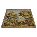 A French Aubusson style tapestry, 20th century, depicting an idealised landscape with two cranes and