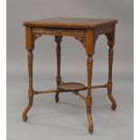A Victorian Aesthetic mahogany envelope card table, with single drawer, raised on turned reeded