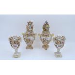 A pair of Dresden pot pourri urns and covers, c.1900, mark of Carl Thieme X and T, the pierced