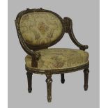 A French giltwood and gesso tub chair, late 19th century, carved frame and floral upholstery, raised