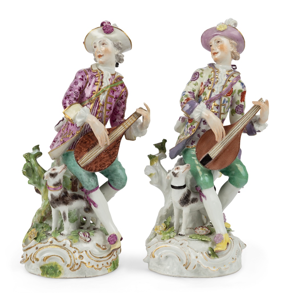 Two Meissen porcelain figures of musicians, c.1755, the decoration probably later, each playing a