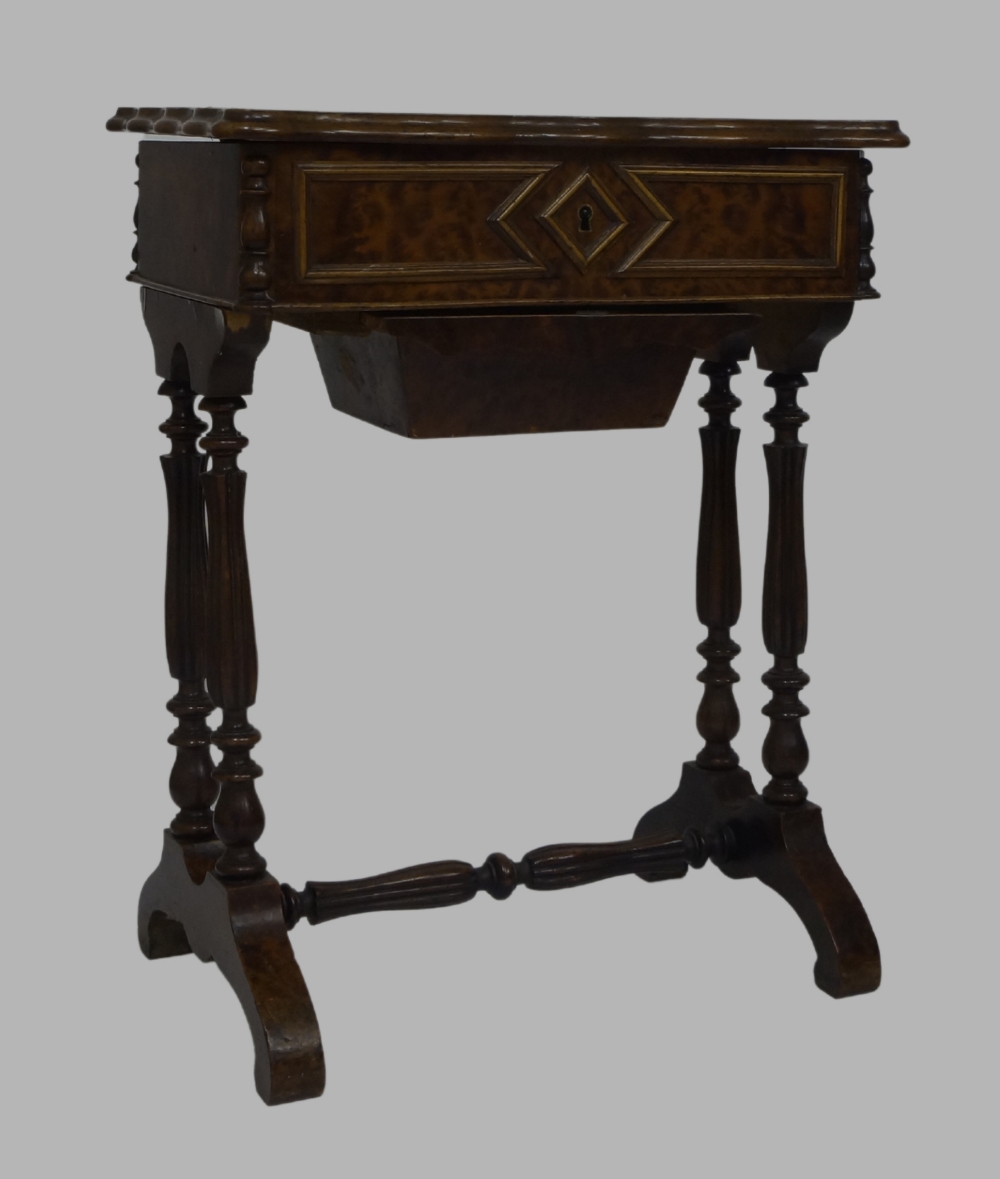 A French burr wood boudoir table, late19th/early 20th century, hinged lid enclosing mirror and