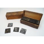 Two boxes of magic lantern slides, early 20th century and later, to include examples published by