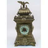 A French gilt-brass mantel clock, late 19th century, the architectural case surmounted with an eagle