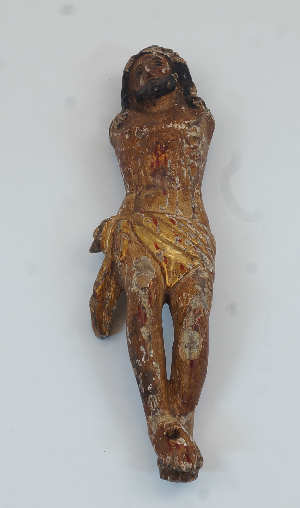 A carved wood sculpture of Crucified Christ, Goa, India, 18th / 19th century, with traces of