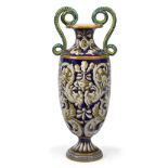 An Italian Colonnata majolica amphora, early 20th century, with scrolling snake form twin handles to