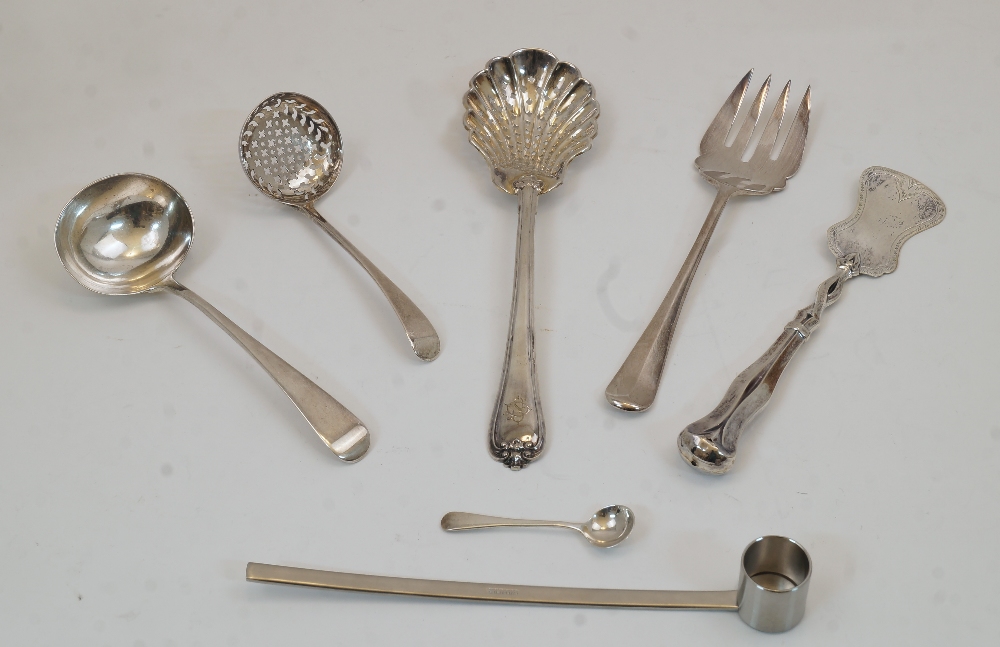 A small group of silver sifting and serving implements, comprising: a George III silver sugar