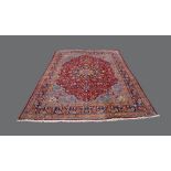 A Persian Kashan carpet, early 21st century, central floral medallion surrounded by floral motifs,