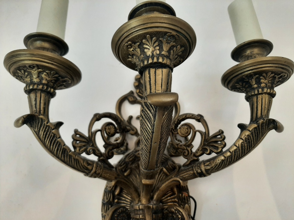 A French gilt-bronze twin-light candelabrum, late 19th century, converted to electricity, with tri- - Image 11 of 16