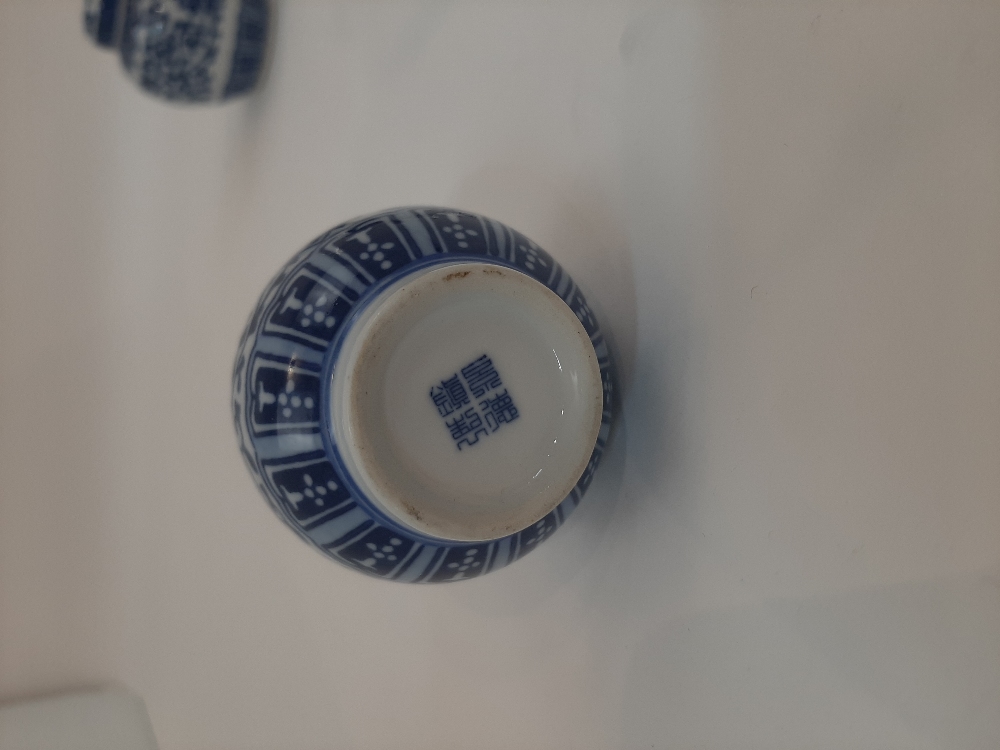 A collection of Chinese objects, 19th-20th century, comprising of two small blue and white jars - Image 2 of 9