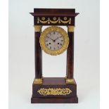 A French gilt-bronze mounted mahogany veneered portico clock, second quarter 19th century, the
