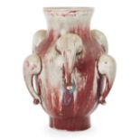 A Chinese flambé glazed vase, late Qing dynasty, of baluster form decorated with stylised elephant