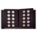 A presentation bound edition of sixty mounted silver coins, issued by John Pinches of London, 'The