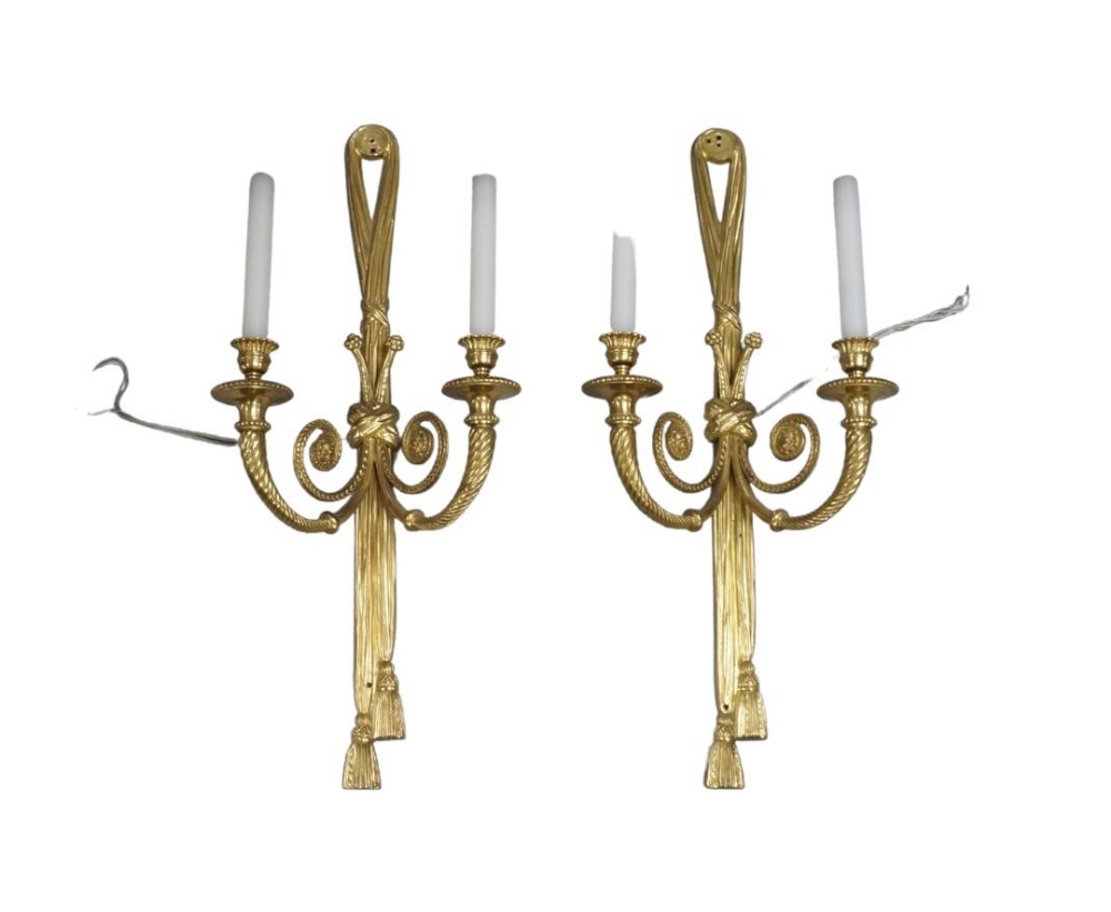 A pair of gilt-bronze twin-light light wall appliques, second half 20th century, each with ribbon-