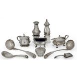 A group of silver cruets and spoons comprising: a pair of Scottish silver sauce ladles, Edinburgh,
