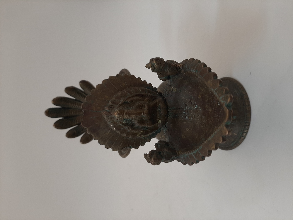 A bronze offering vessel with figure of Ganesha, Nepal, 17th-18th century, on a played foot, the - Image 4 of 4