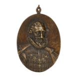 After Guillaume Dupré, French, 1574-1643, a French bronze oval portrait plaque depicting Henry IV,