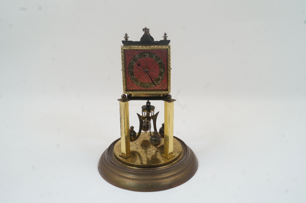 A brass anniversary clock, 20th century, with an adjustable four ball rotary pendulum, the square - Image 2 of 4