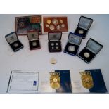 An Elizabeth II silver Maundy set, 1999, in Royal Mint presentation case; together with a silver