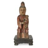 A Chinese carved and parcel-gilded wood figure of a mother and child, 20th century, modelled