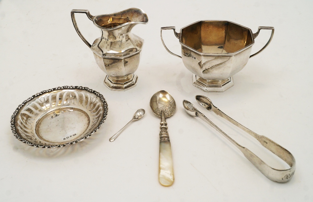 A mixed group of silver, comprising: a milk jug and twin handled sugar bowl, London, 1925, Thomas