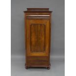 A French mahogany pedestal cabinet, early 20th century, the stepped cornice above single drawer, a