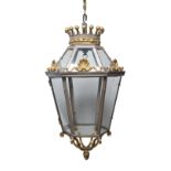 A grey painted and parcel gilt metal hexagonal hall lantern, 20th century, the corona in the form of