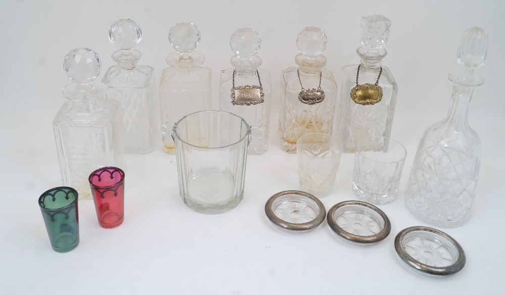 A group of cut crystal and glass decanters, 20th century, of which six are of rectangular form