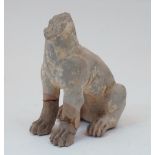 A Romano-Egyptian style lion, after the Antique, modelled seated on all fours, lacking a head, 16.