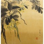 A Chinese watercolour painting of flowering branches, 20th century, with artist's signature and seal